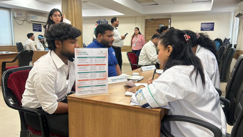 Nutritionist consulting patient at ICSI camp.