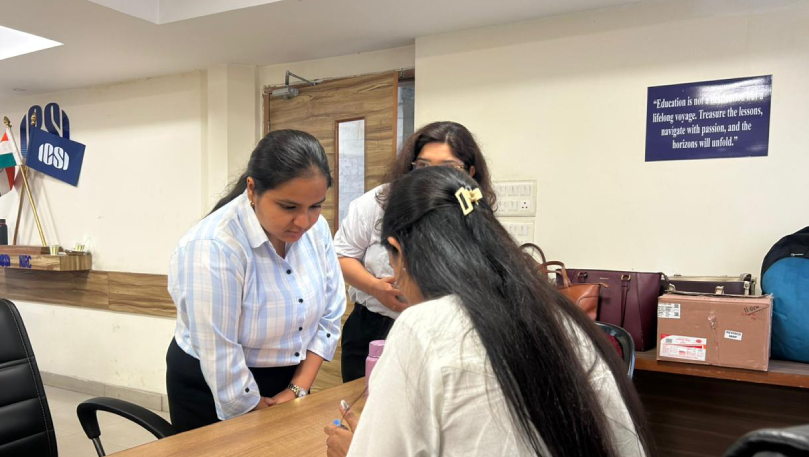 Staff assisting participant at ICSI health camp.