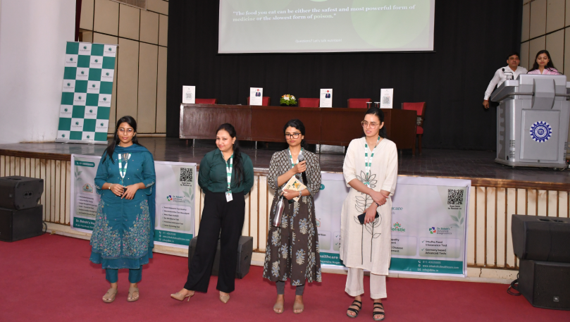 Team presenting at CSIR wellness event.