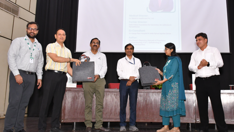 Mementos exchanged on stage at CSIR wellness event.
